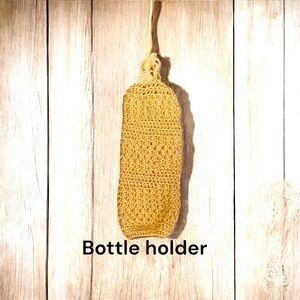 Handmade Crochet Bottle Holder. Interesting pattern.